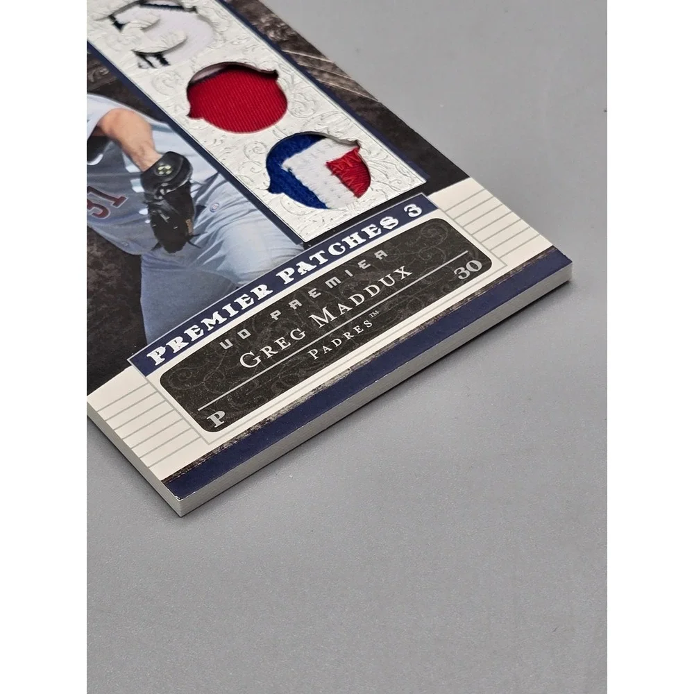 2007 Upper‎ Deck Premier Patches Greg Maddux Triple Relic Jersey 76/87 Padres